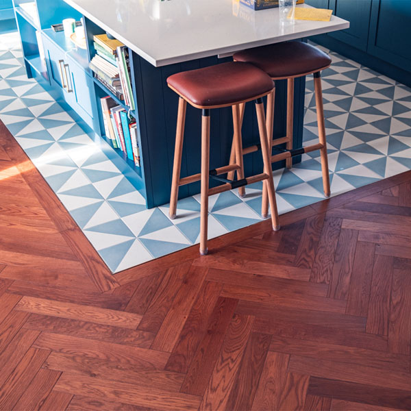 Wooden floor detail around kitchen island