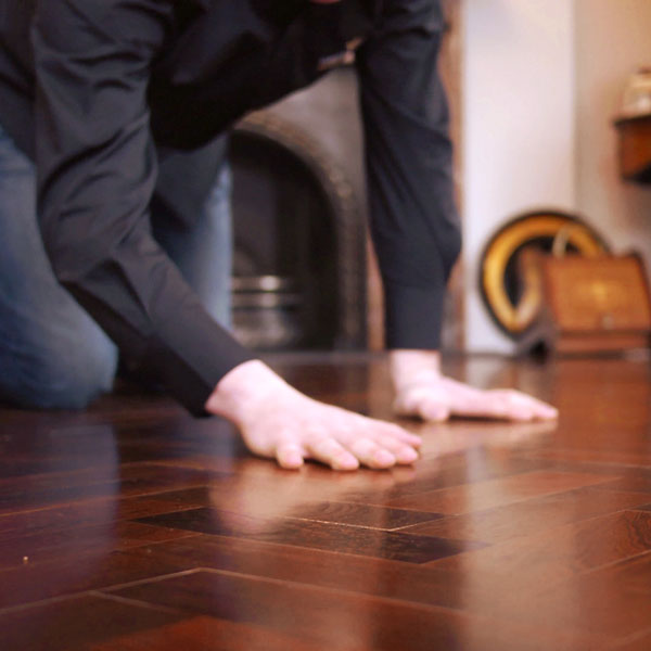 examining wooden floors